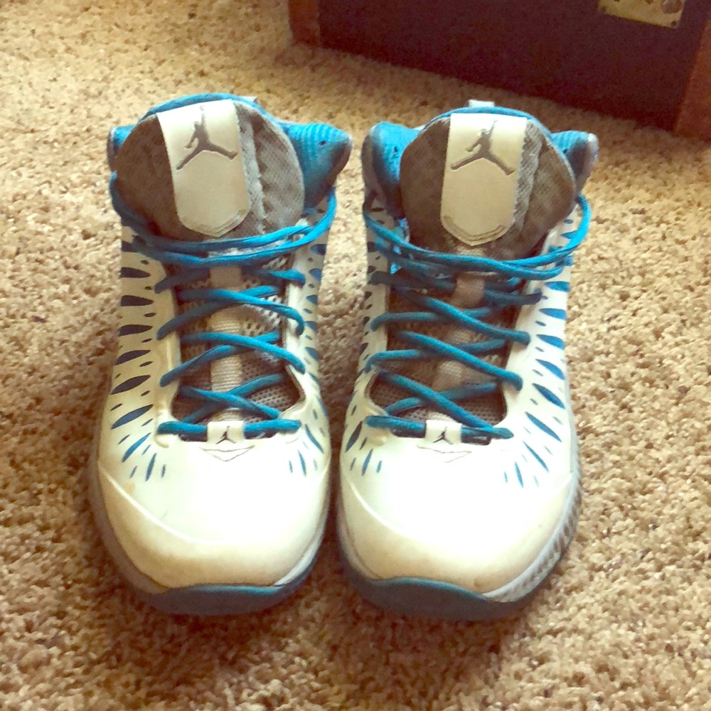 White and blue Jordan’s